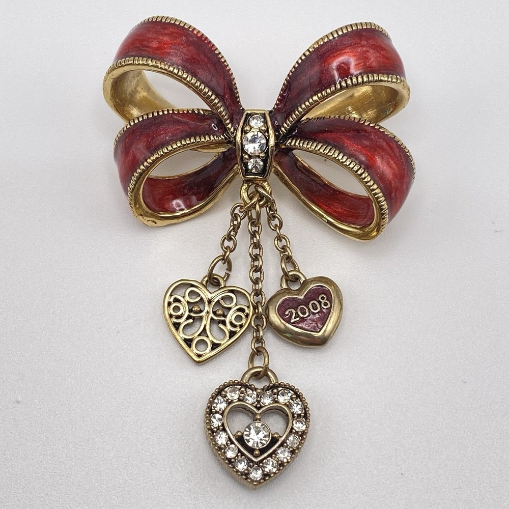 Monet Gold Tone Enamel Bow Brooch 2008 Red Rhinestone Heart Charms 2"